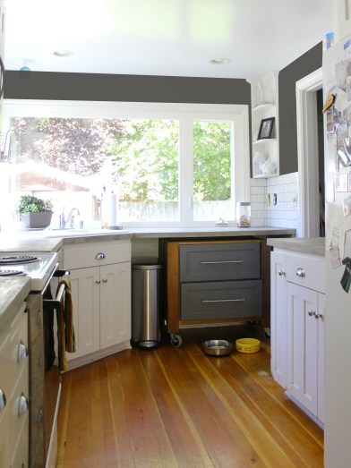 grey wall white cabinet